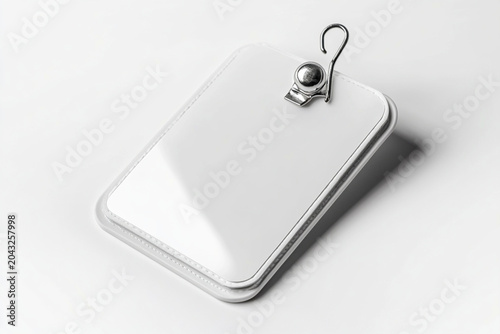 Blank ID badge with metal clip on white background