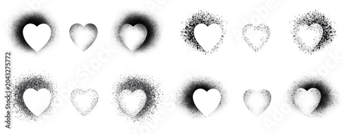 Vector illustrations of black isolated paint splatters. Black isolated hearts made of paint splatters and aerosol splashes on a white background.