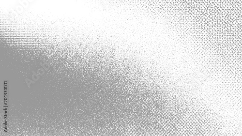 Photos Gradient of grey dots fading from dense clusters to sparse specks against a whit