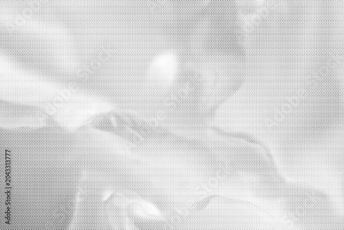 Subtle halftone dot gradient texture on a transparent background. Minimalist dithered backdrop for design.