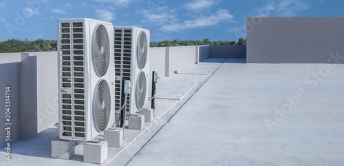 Bild auf Leinwand air conditioning and ventilation systems are installed on the roof of an industrial building