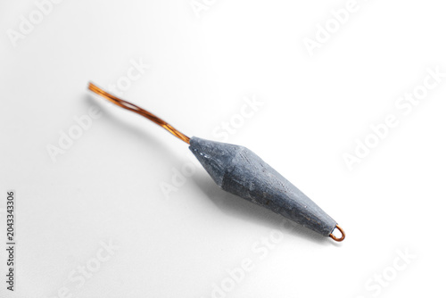 Photography Old lead fishing sinkers on a white background. fishing tools.