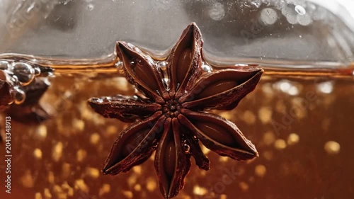 Star Anise Spice Infused in Warm Amber Liquid
