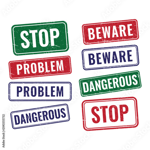 Foto Collection of rectangular rubber stamps with stop beware problem text