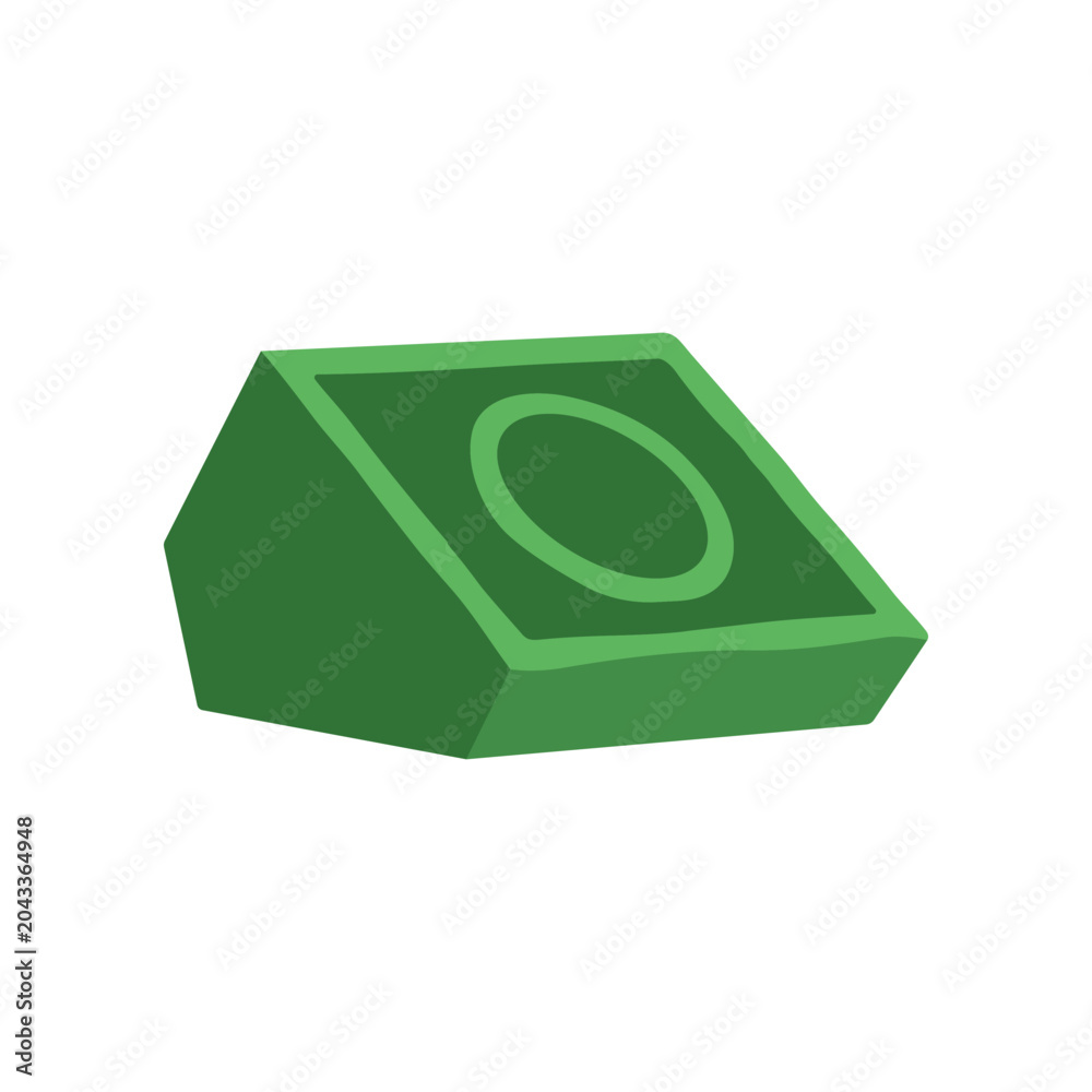 Obraz premium Green plastic toy brick block piece.