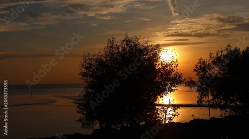 Amazing sunset view at Pontian, Johor., Malaysia. The sunset transforms the sky into a masterpiece of vibrant hues