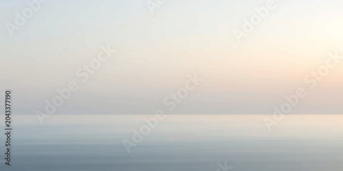 Bild auf Leinwand A serene seascape at dawn, with the soft pastel hues of sunrise gently kissing the tranquil horizon where the sky meets the sea