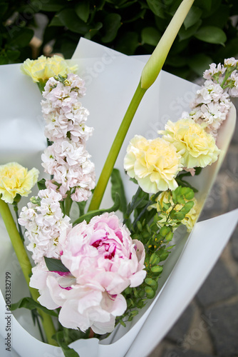 Stalls with flowers and bouquets at local street market