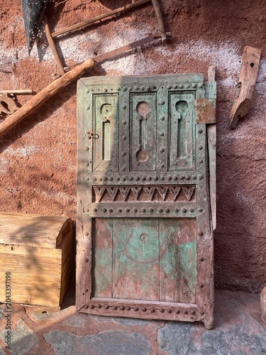 A collection of antique, rustic wooden objects from Morocco. 