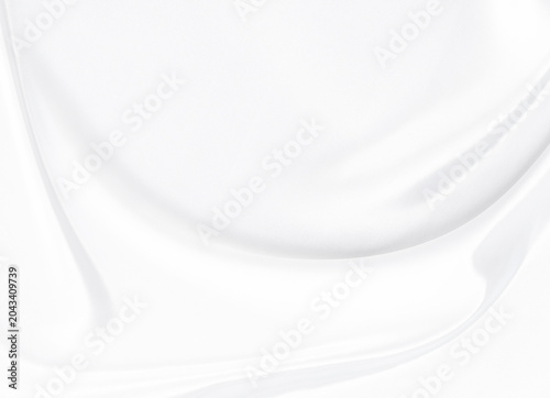 White gray satin texture that is white silver fabric silk background with beautiful soft blur pattern natural.