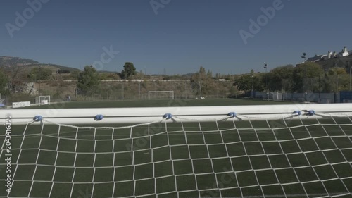 Football soccer field ground pitch stadium goal net crane jib traveling down 2