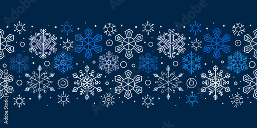 Foto snowflake pattern on dark blue background winter