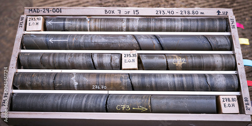 Mineral exploration drill cores in wooden core box