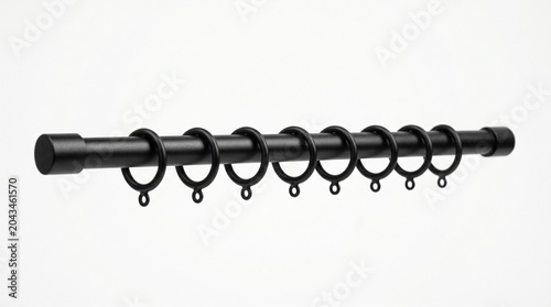 Black curtain rod with rings for hanging curtains in a simple design and style meant for home use