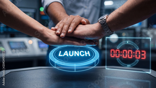 Team hands stacked on glowing launch button, initiating critical countdown in high-tech control room.