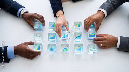 Business People Collaborating On Financial Data Analysis With Growth Charts And Market Trends