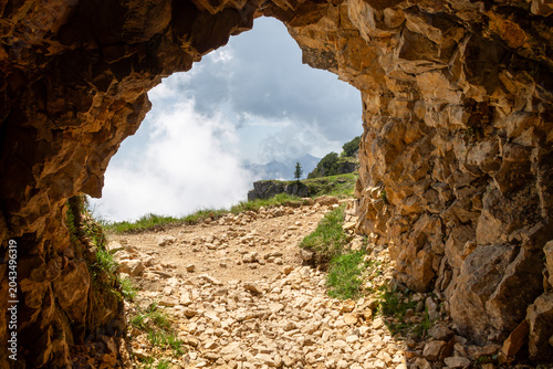 Mountain Trekking Through Historic Alpine Tunnels