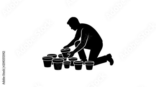Quadro su tela A black silhouette of a man kneeling and tending to several small flower pots