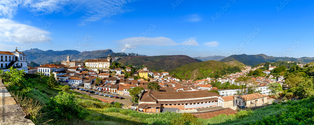 Fototapeta premium Panoramic view of the city of Ouro Preto through the typical hills of Minas Gerais.