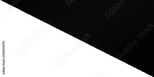 Tableau sur toile Geometric contrast of black and white split diagonally across the frame, creating a stark visual division