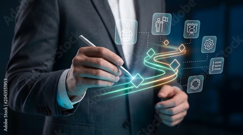 A businessman in a suit draws a glowing roadmap with icons representing business strategy and goals.