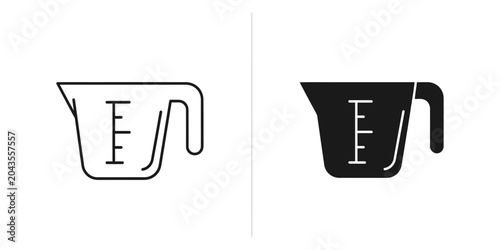 Foto Measuring cup with clear lines on white and black backgrounds for culinary and s