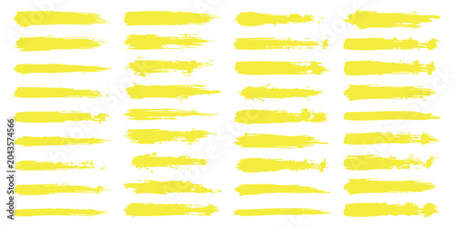 Quadro su tela Set of yellow paint brush strokes for artistic design elements isolated on a pla