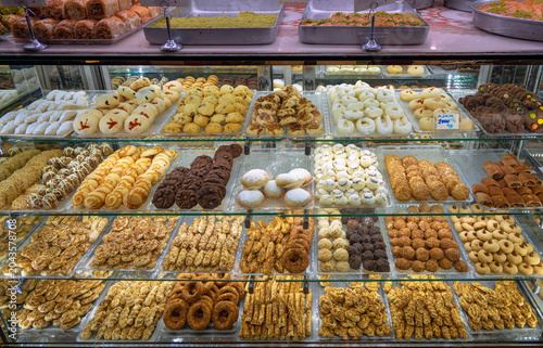 different small sweet and salty pastries in the display case of a pastry shop in Famagusta on Cyprus