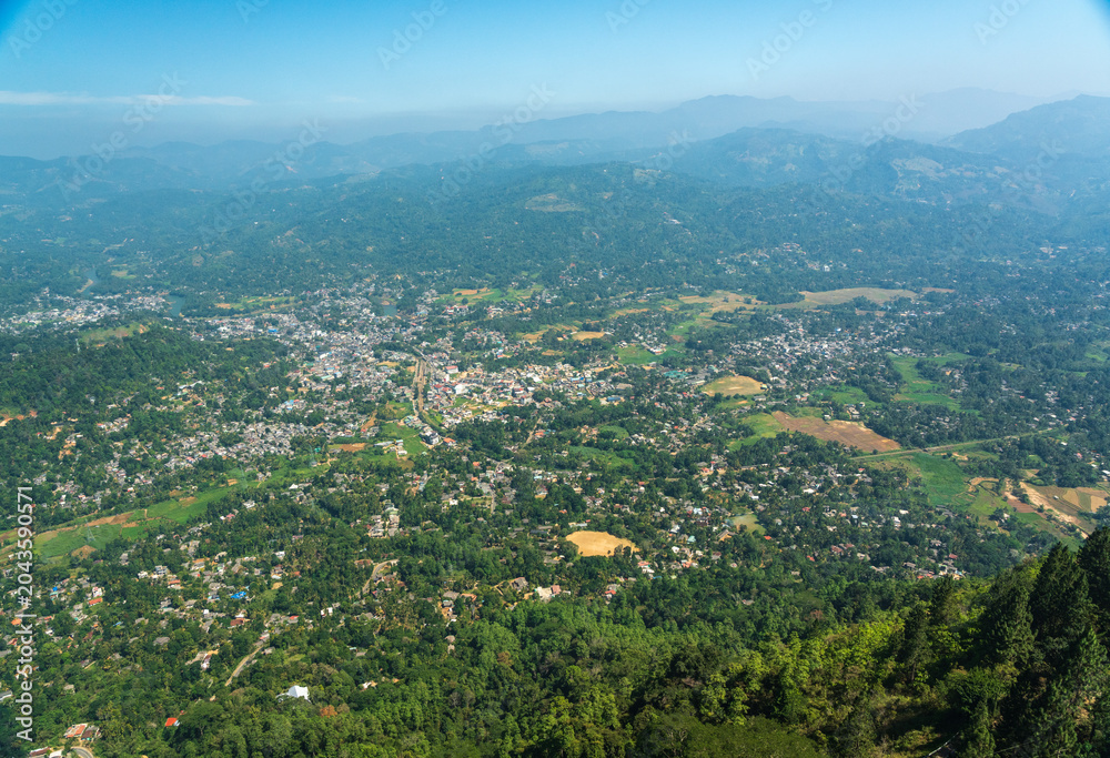 Fototapeta premium Panoramic mountain view of a jungle town