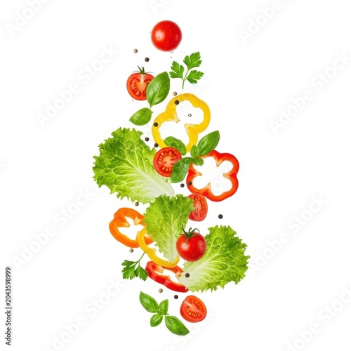 Falling fresh vegetables and herbs with vegetables tomatoes levitation ingredients