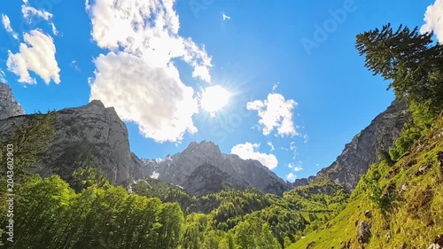 4K Timelapse alpine video with moving clouds at Kaiserbachtal valley, Griesenau, Wilder Kaiser, Kitzbuehel, Tyrol, Austria