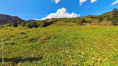 4K Timelapse alpine video with moving clouds at Kaiserbachtal valley, Griesenau, Wilder Kaiser, Kitzbuehel, Tyrol, Austria