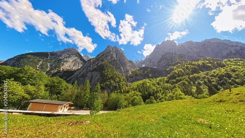 4K Timelapse alpine video with moving clouds at Kaiserbachtal valley, Griesenau, Wilder Kaiser, Kitzbuehel, Tyrol, Austria