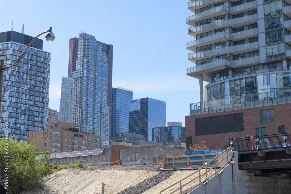 Naklejka premium looking northwest from Lake Shore Blvd E and Lower Jarvis St to (at left) Market Wharf, a condo, and office buildings One King St / Scotia Plaza, Toronto
