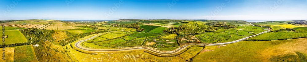 Obraz premium Litlington White Horse over Cuckmere Valley from a drone, Hindover Hill, South Downs, East Sussex, England