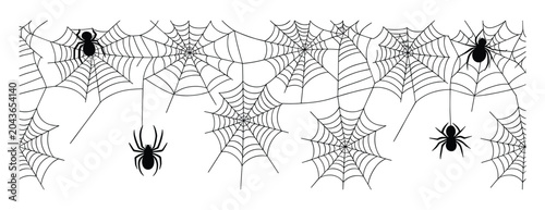 фотографія Spooky Spiderwebs: A collection of intricate spiderwebs adorned with several spiders, creating an eerie and unsettling atmosphere perfect for Halloween or a horror theme