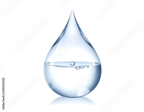 A large, transparent teardrop-shaped water droplet with a smaller bubble inside