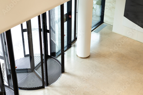 Revolving door entrance in modern office building