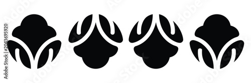 Foto Set of four identical black crests or heraldic symbols on white background