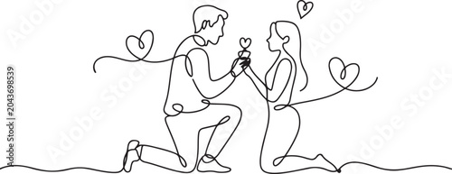Foto The guy makes a marriage proposal to his girlfriend