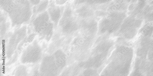 Foto A close-up abstract view of rippling water's surface with light reflections