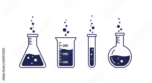 Set of laboratory glassware including beakers and flasks containing chemical liquids with rising bubbles for science research.