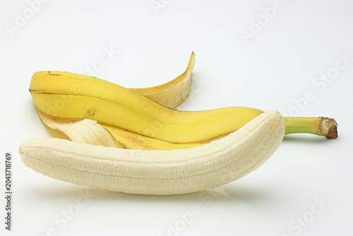 Fotografi Fresh Ripened Bananas on white background
