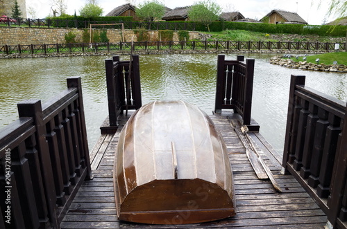 Historical park in Neofit Rilski, Bulgaria, overlooking a large lake with fences and passages, symbolically connecting the different eras of our lands 