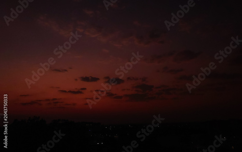 time lapse sunset, Dark red night sky background, silhouette of trees, nature photography