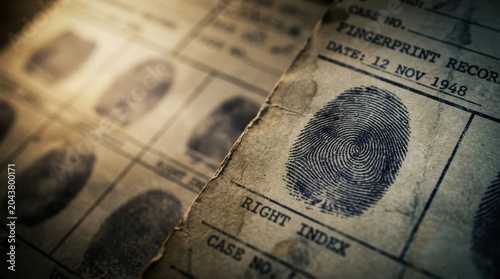 Close-up of a vintage fingerprint record card showing a right index print, dated 1948.