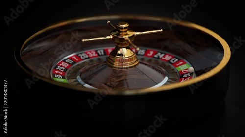 Casino Roulette Wheel Spinning and Ball in Flight with Selective Focus