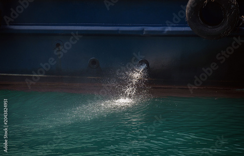 water from a ship to cool the engine, discharge. Outflow of ballast water from ship.	
