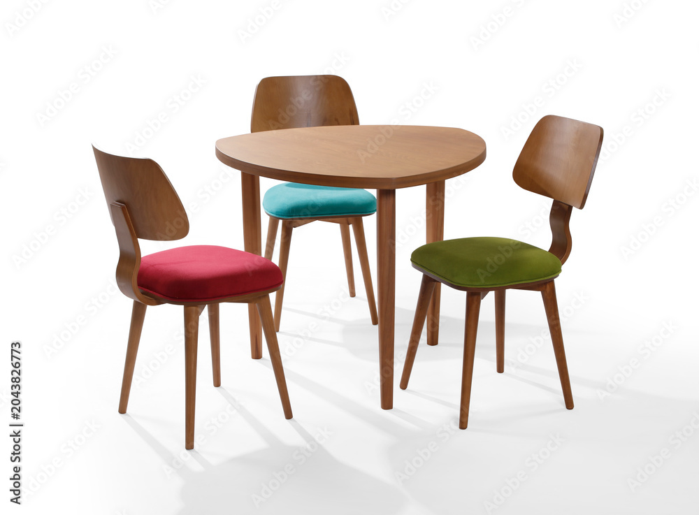 Obraz premium Modern Triangular Wooden Dining Table Set with Colorful Plywood Chairs isolated on white background .