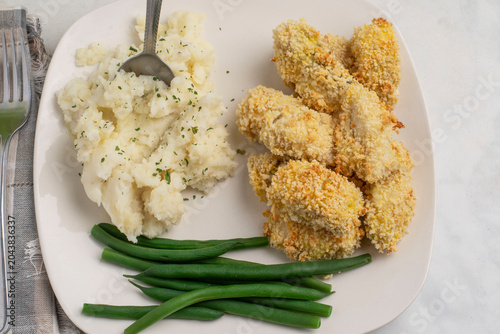 Canvas Print haddock bites with mash potatoes  andgreen beans